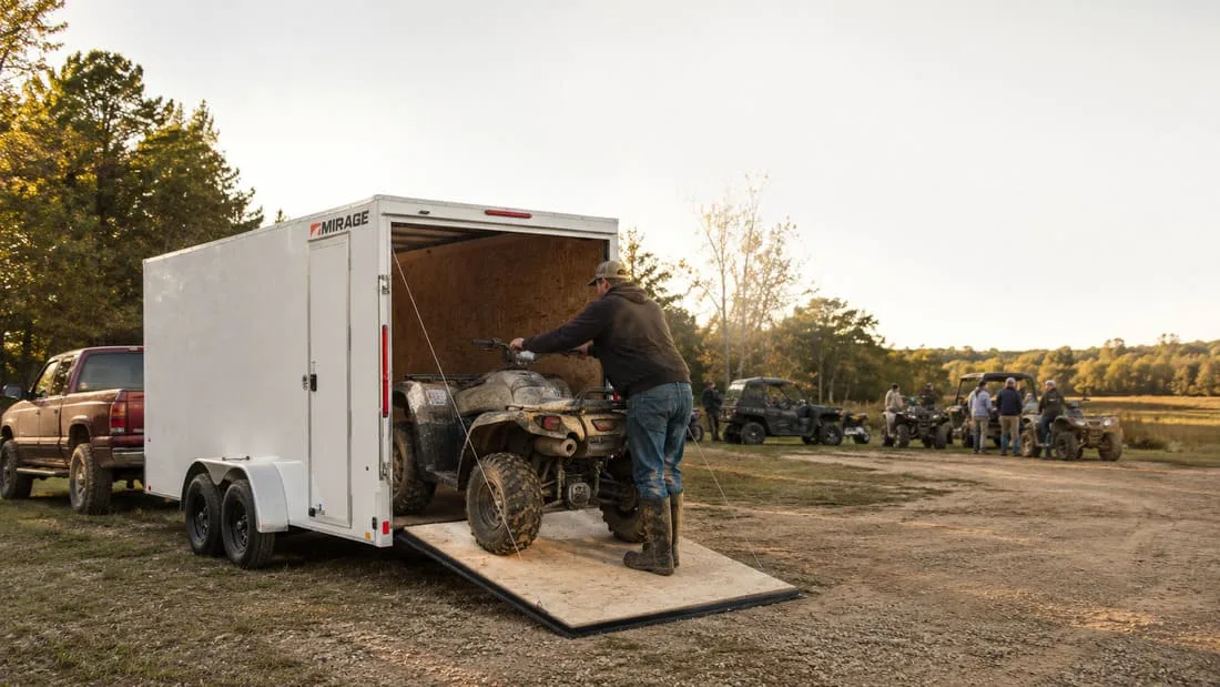 mirage-3 Loading lawn care equipment into a Mirage XPO enclosed trailer